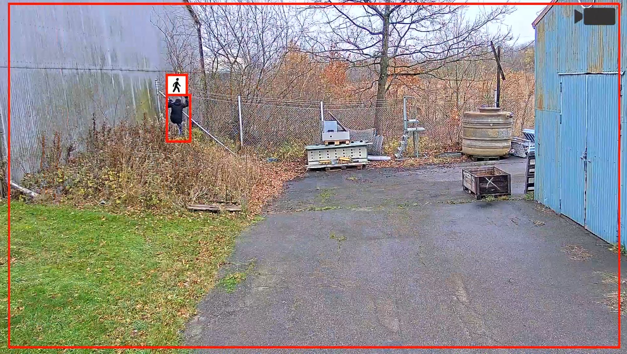 Camera view with analytics highlighting a person on a monitored site
